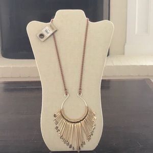 Beautiful necklace with tags.